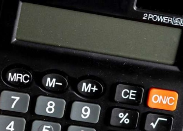 Close-up of a calculator symbolizing the reduction of the total cost of the loan (APR)
